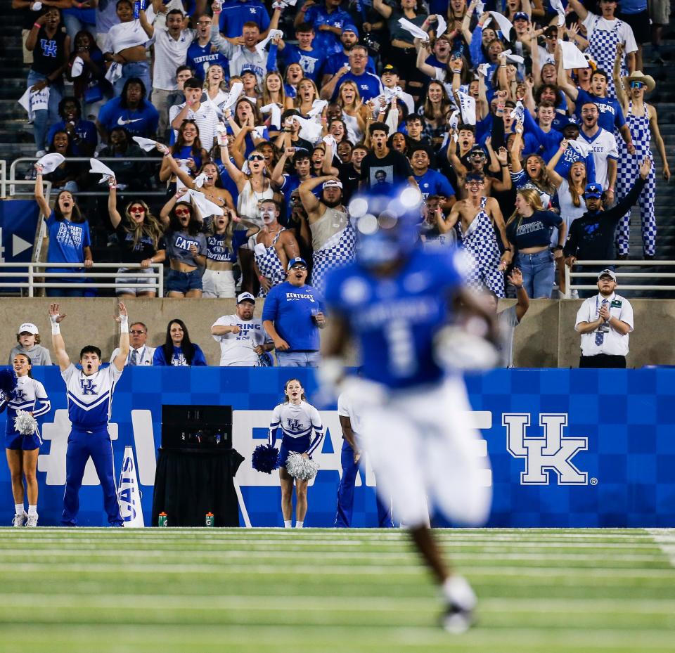 The UK student section celebrates as Kentucky Wildcats running back Ray Davis (1) runs more than 50 yards for a touchdown in the third quarter against Akron at Kroger Field in Lexington. Sept. 16, 2023