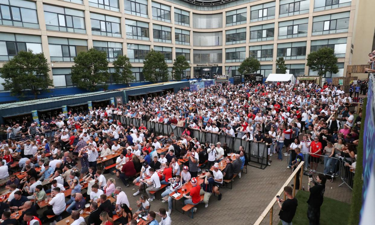 <span>England fans at Central Park, Newcastle, watching a screening of the Euros Group C match between Denmark and England.</span><span>Photograph: Scott Heppell/PA</span>