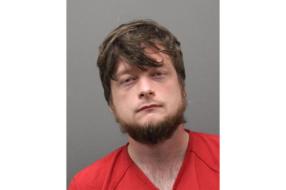 This booking photo provided by Loudoun County, Va., Sheriff's Office shows Alan Colie. Colie faced a preliminary hearing Wednesday, May 3, 2023, on charges that he shot and wounded Tanner Cook, 21, who operates a YouTube channel called “Classified Goons” and had targeted Colie for his latest prank. (Loudoun County Sheriff's Office via AP)