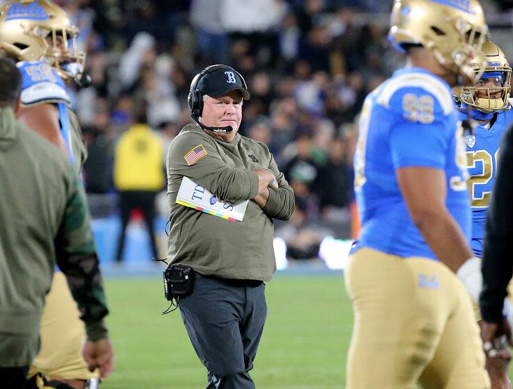 UCLA coach Chip Kelly looks on from the sideline and reacts after the Bruins failed to score against Arizona State