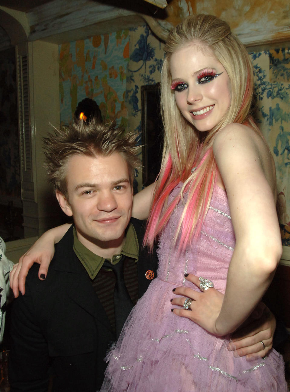 Avril Lavigne’s love of colored hair extensions outlasted her love for her first husband, Deryck Whibley, pictured with her in 2007. (Photo: Theo Wargo/WireImage)