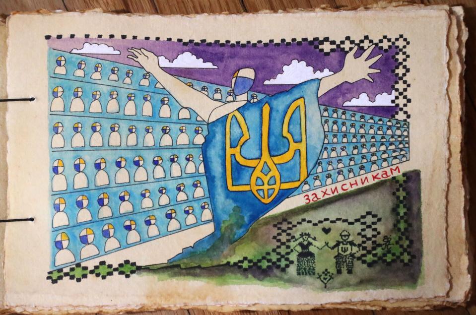 In another drawing, Richard references the Wall of Remembrance, located in Ukraine’s capital, Kyiv, which pays homage to those who have fought to defend the country since 2014. “The two characters at the bottom of the drawing are embroidered,” Richard said. “I took the motif from a shirt that Zelensky wore where there is this couple holding hands. It’s a way to represent him in the drawing without him being there physically.”