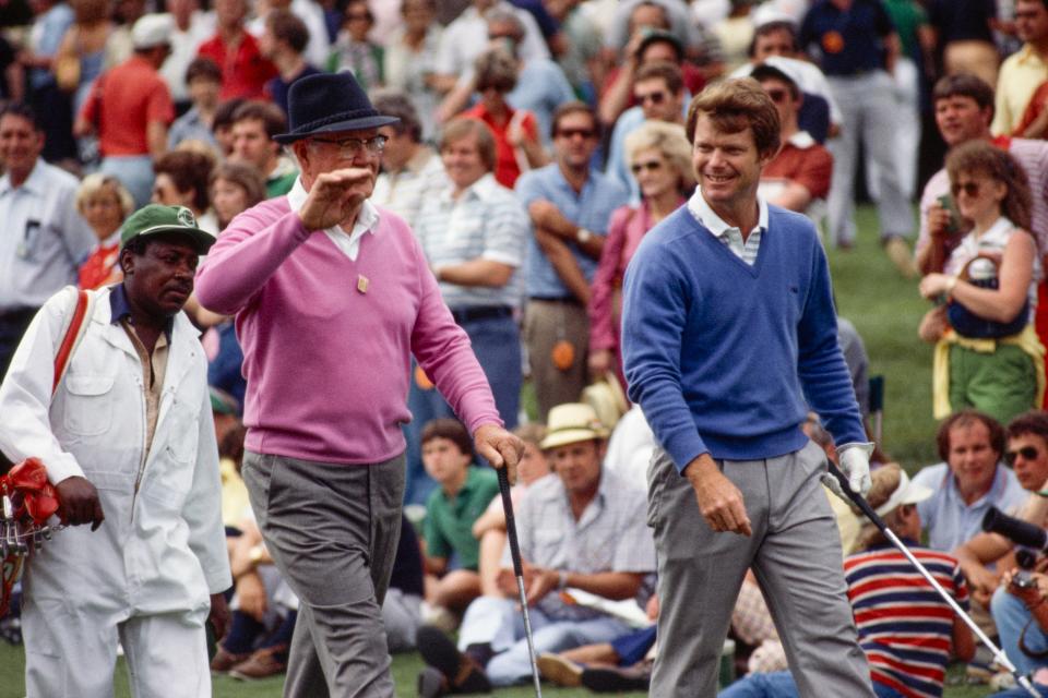 Tom Watson is joined by Byron Nelson during the 1981 Masters Par-3 Contest at Augusta National on April 8, 1981.