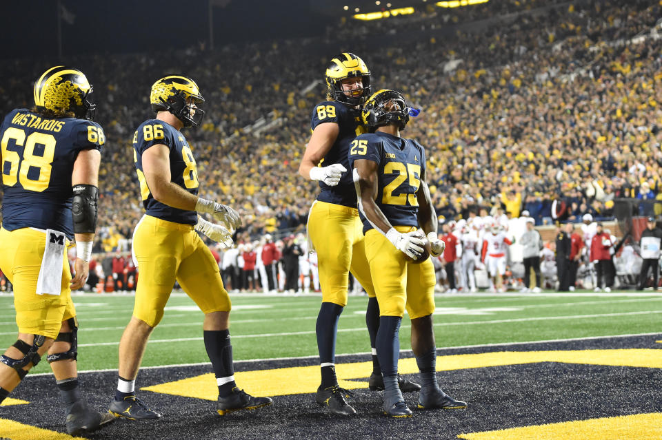 ANN ARBOR, MI - NOVEMBER 06: Michigan Wolverines running back Hassan Haskins (25) celebrates his touchdown run during the Michigan Wolverines vs Indiana Hoosiers game on Saturday November 6, 2021 at Michigan Stadium in Ann Arbor, MI. (Photo by Steven King/Icon Sportswire via Getty Images)