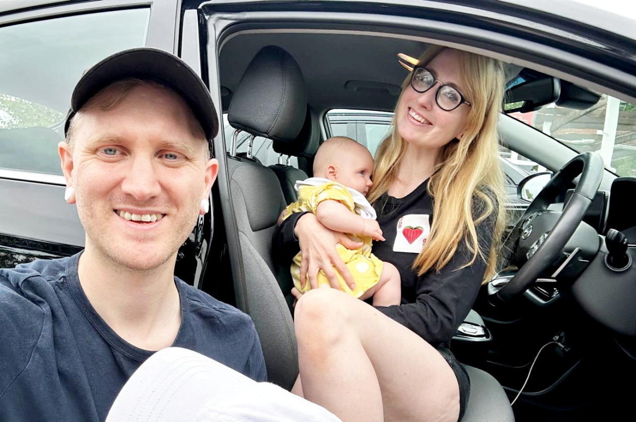 Izzy Farrell gave birth to her baby in the car on the hard shoulder of the M2, pictured with partner Christian Guthrie and baby Aura. (Isobel Farrell/SWNS)