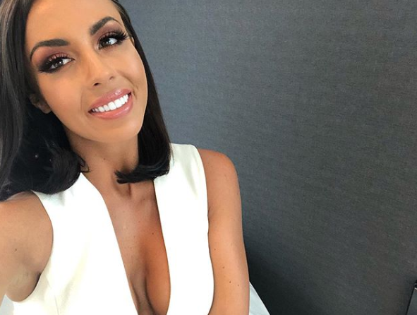 MAFS 2020 bride Natasha Spencer poses for a selfie in a white plunging top