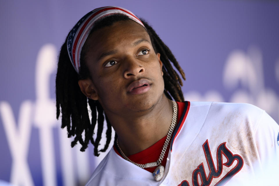 Washington Nationals' CJ Abrams looks on from the dugout after the eighth inning of a baseball game against the Colorado Rockies, Wednesday, July 26, 2023, in Washington. The Nationals won 5-4. (AP Photo/Nick Wass)