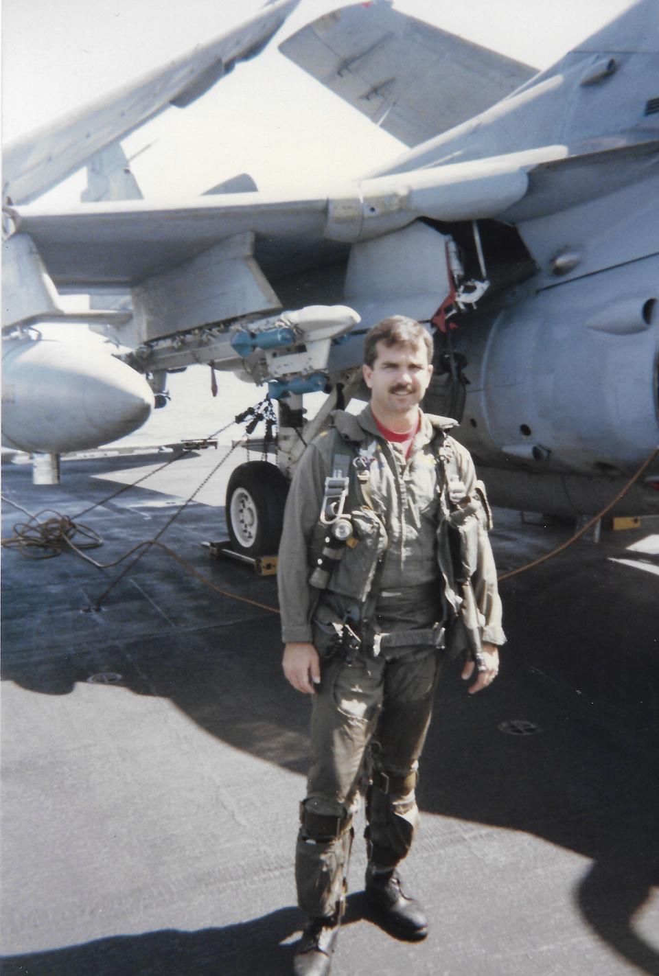 This image provided by Betty Seaman shows Navy A-6 Intruder pilot Jim Seaman. Navy Capt. Jim Seaman died of lung cancer at the age of 61. His widow Betty Seaman has been part of a large group of aviators and their surviving spouses who have lobbied Congress and the Pentagon for years to look into the number of cancers aviators and ground crew face. (Betty Seaman via AP)