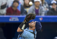 Toronto Blue Jays catcher Alejandro Kirk catches a popup by Seattle Mariners' Jesse Winker during the second inning of a baseball game Tuesday, May 17, 2022, in Toronto. (Frank Gunn/The Canadian Press via AP)