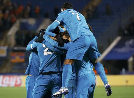 Football Soccer - Zenit St. Petersburg v Valencia - Champions League Group Stage - Group H - Petrovsky stadium, St. Petersburg, Russia - 24/11/2015 Zenit St. Peterburg's players celebrate scoring the second goal for Valencia with Artem Dzyuba REUTERS/Grigory Dukor