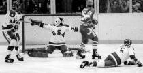 In this Feb. 22, 1980, photo, United States goalie Jim Craig sprawls to make a save on the Soviet Union's Vladimir Golikov during a medal-round game at the Winter Olympics in Lake Placid, N.Y. Tourism is a $1.2 billion industry in the Lake Placid region, much of it still fueled by the memory of the U.S. hockey team beating the Soviet Union as the “Miracle on Ice" highlight of the 1980 Olympic Games. (Tom Sweeney/Star Tribune via AP)