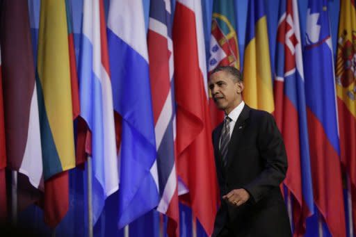 US President Barack Obama arrives for a press conference at the closing of the NATO summit on May 21, 2012 in Chicago, Illinois. NATO leaders mapped a path out of the unpopular war in Afghanistan, backing plans to hand Afghans the combat lead from mid-2013 while vowing to stand by them as they seize their own destiny