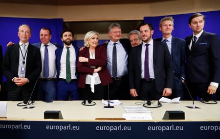 Finnish MEP Halla-Aho, Austrian MEP Vilimsky, Italian MEP Zanni, French far-right National Rally party leader Le Pen, German MEP Meuthen, Belgian MEP Annemans and French MEP Bay, Danish MEP Kofod and Estonian MEP Madison pose in Brussels
