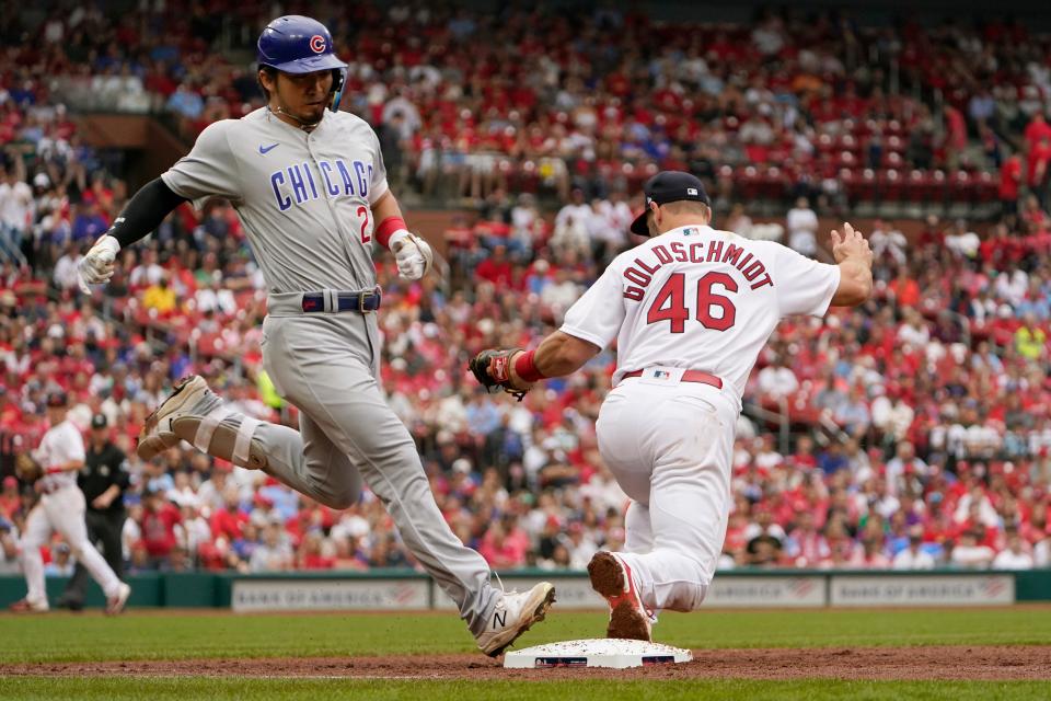 Chicago Cubs' Seiya Suzuki grounds out as St. Louis Cardinals first baseman Paul Goldschmidt (46) handles the throw during the sixth inning of a baseball game Sunday, Sept. 4, 2022, in St. Louis. (AP Photo/Jeff Roberson)