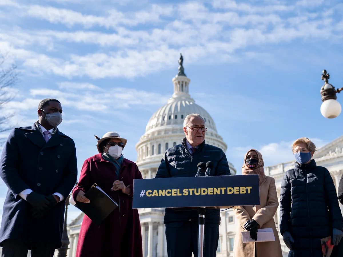 Biden must release an almost year-old student-debt memo and 'immediately' cancel up to $50,000 in loans before payments resume, Elizabeth Warren, AOC, and 83 other Democrats say