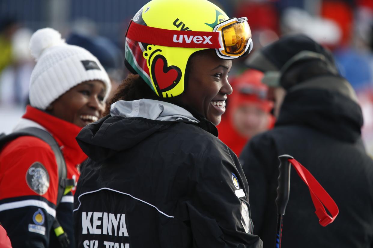 Kenya’s Sabrina Simader smiles in the finish area after completing an alpine ski, women’s World Cup super-G, in St. Moritz, Switzerland, Saturday, Dec. 9, 2017. (AP Photo/Giovanni Auletta)