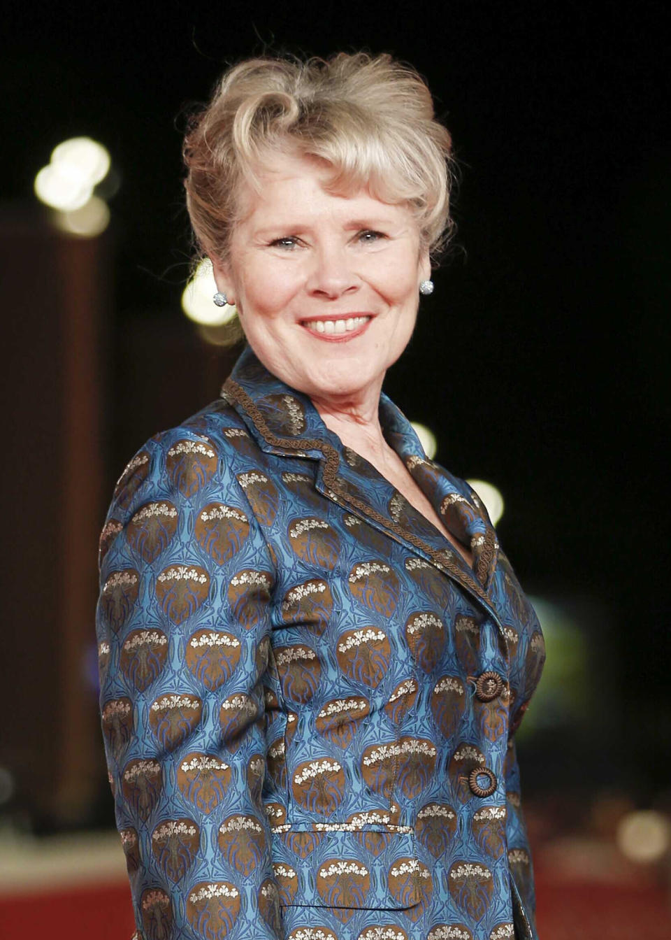 FILE - This Oct. 19, 2019 file photo shows actress Imelda Staunton on the red carpet for the movie "Downton Abbey" at the Rome Film Fest in Rome. Staunton has been tapped to be the last actress to play Queen Elizabeth II in the Netflix series "The Crown." She will take the crown in the fifth and final season of the series. (AP Photo/Domenico Stinellis, File)