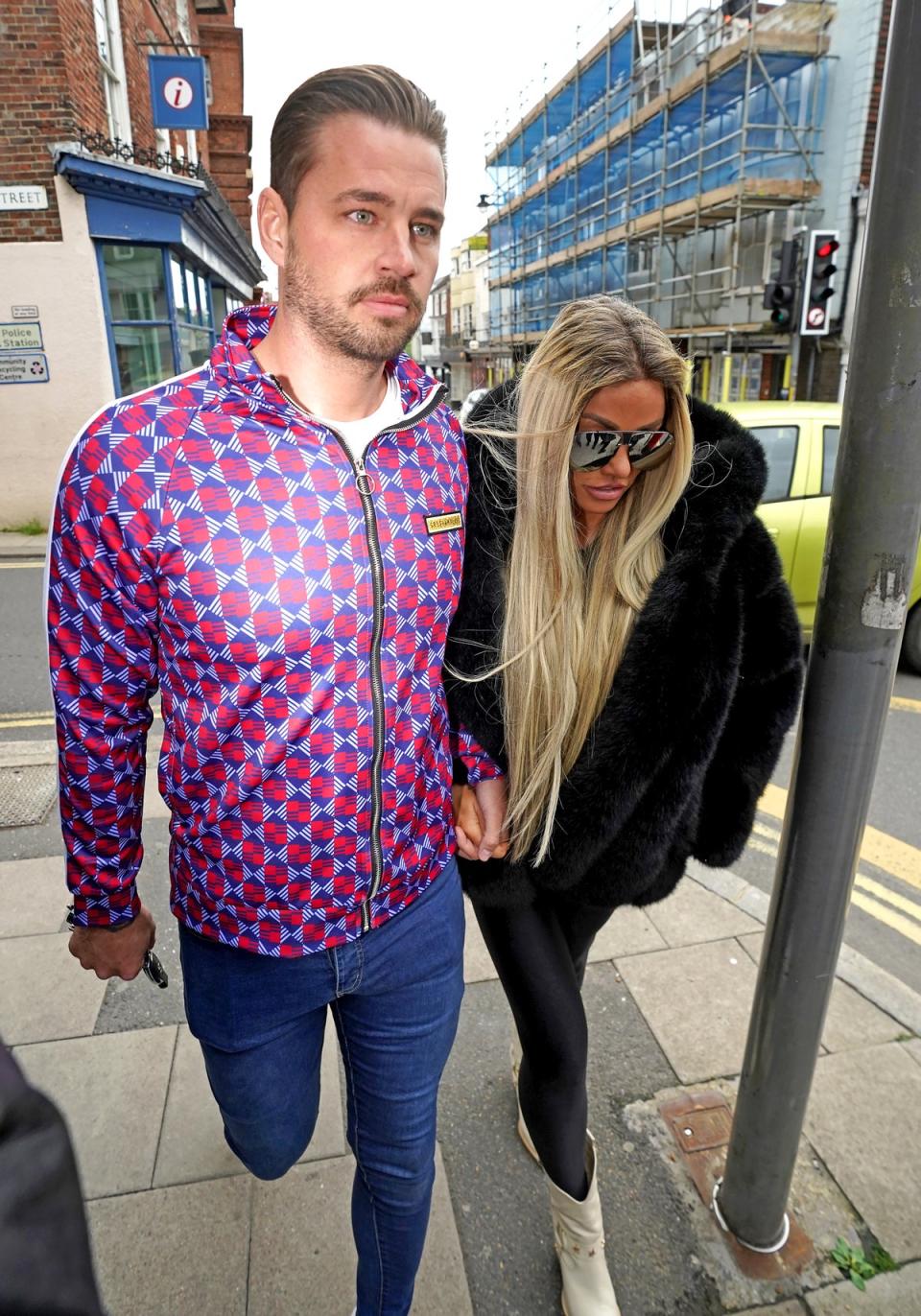 Katie Price alongside fiancee Carl Woods arrives at Lewes Crown Court, West Sussex, where she is appearing on charges of breaching a restraining order. Picture date: Wednesday May 25, 2022 (Steve Parsons/PA) (PA Wire)