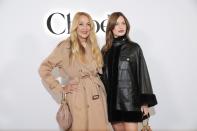 Jerry Hall, left, and Georgia May Jagger attend the Chloe Fall/Winter 2024-2025 ready-to-wear collection presented Thursday, Feb. 29, 2024 in Paris. (Photo by Scott A Garfitt/Invision/AP)