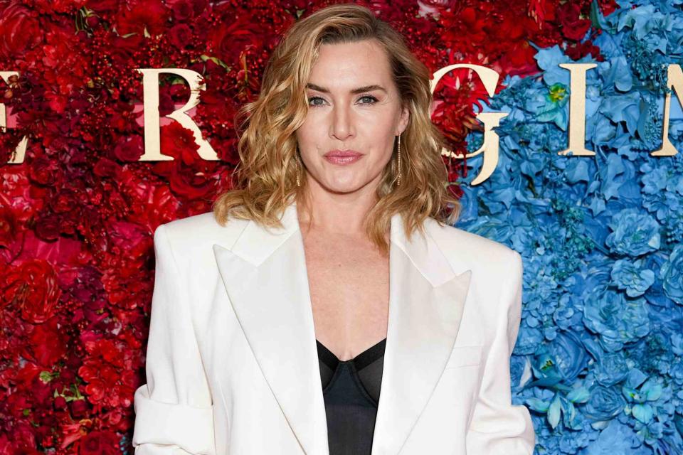 <p>John Nacion/Variety via Getty</p> Kate Winslet poses in front of a floral wall during the New York premiere of "The Regime"