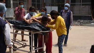 <div class="paragraphs"><p>(File photo)</p><p>Patna: Family members mourn the death of a COVID-19 victim at Patna Medical College and Hospital (PMCH), during the second wave of the coronavirus pandemic , in Patna, Wednesday, May 5, 2021</p></div>