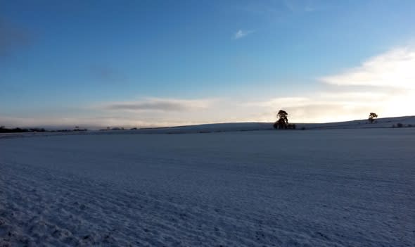 Snow, gales and tornados bring travel chaos to Britain