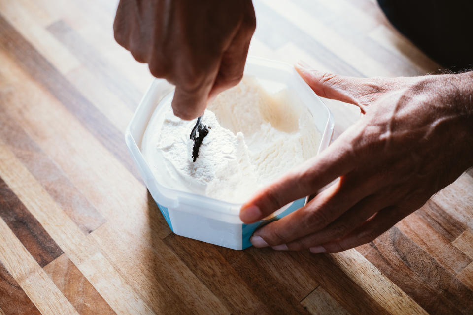 A man preparing vegan frozen yogurt / ice cream