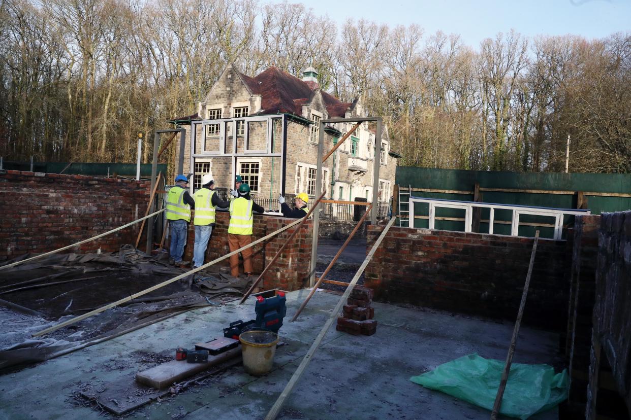 A beloved pub was knocked down - and moved brick-by-brick ten miles to be rebuilt inside a MUSEUM.  The Vulc<an pub served generations of boozers in Cardiff for more than 160 years only to be demolished for a shopper's car park.  More than 5,000 campaigners signed a petition to save it - and now their wish will come true.  Pictured here being rebuilt at St Fagans museum.  Â© WALES NEWS SERVICE    