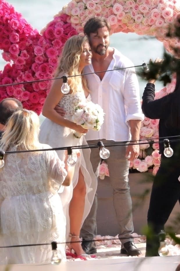 The intimate ceremony was captured by 'Real Housewives of Beverly Hills' cameras, a source tells ET.