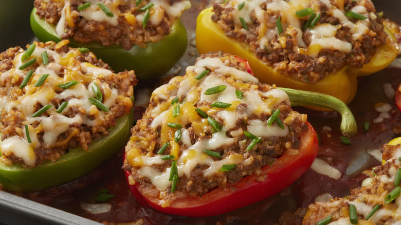 bell pepper halves stuffed with ground beef and tomato sauce topped with cheese
