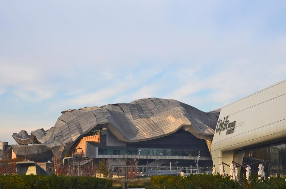 The exterior of a shopping district in Milan designed by Isozaki and Zaha Hadid.