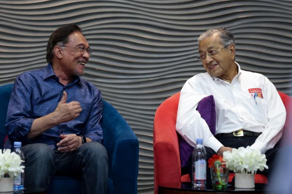 Datuk Seri Anwar Ibrahim speaks to Tun Dr Mahathir Mohamad during PKR’s retreat at the Lexis Hibiscus resort in Port Dickson July 19, 2019. — Picture by Ahmad Zamzahuri