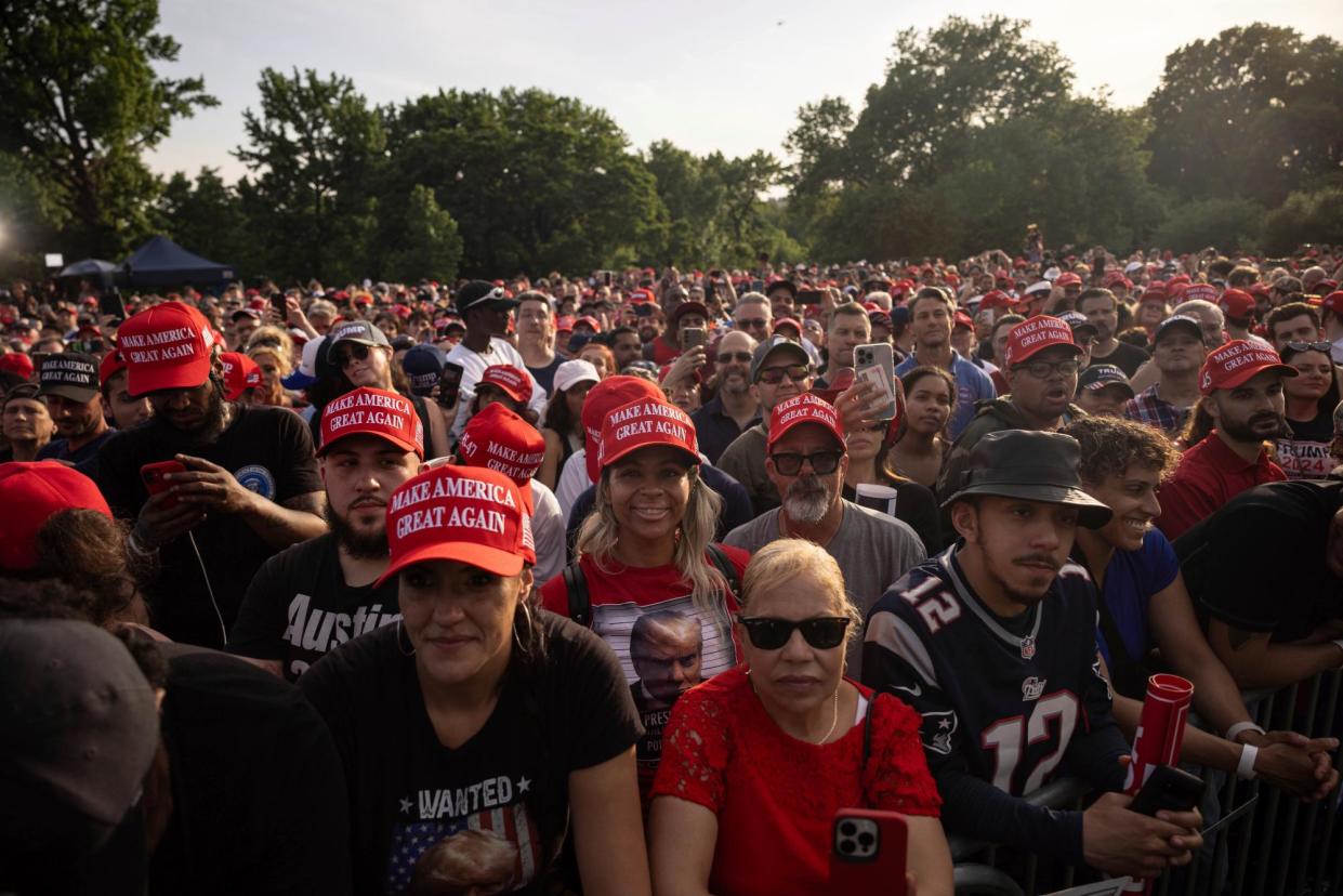 <span>Supporters of the republican presidential candidate former President Donald Trump gather during a campaign rally in the South Bronx, in New York.</span><span>Photograph: Yuki Iwamura/AP</span>