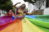 <p>A performer joins in the celebrations during the Notting Hill Carnival in London, England. This colourful Carnival has taken place every year since 1966 and is one of the largest street festivals in Europe. (Ben A. Pruchnie/Getty Images)<br></p>