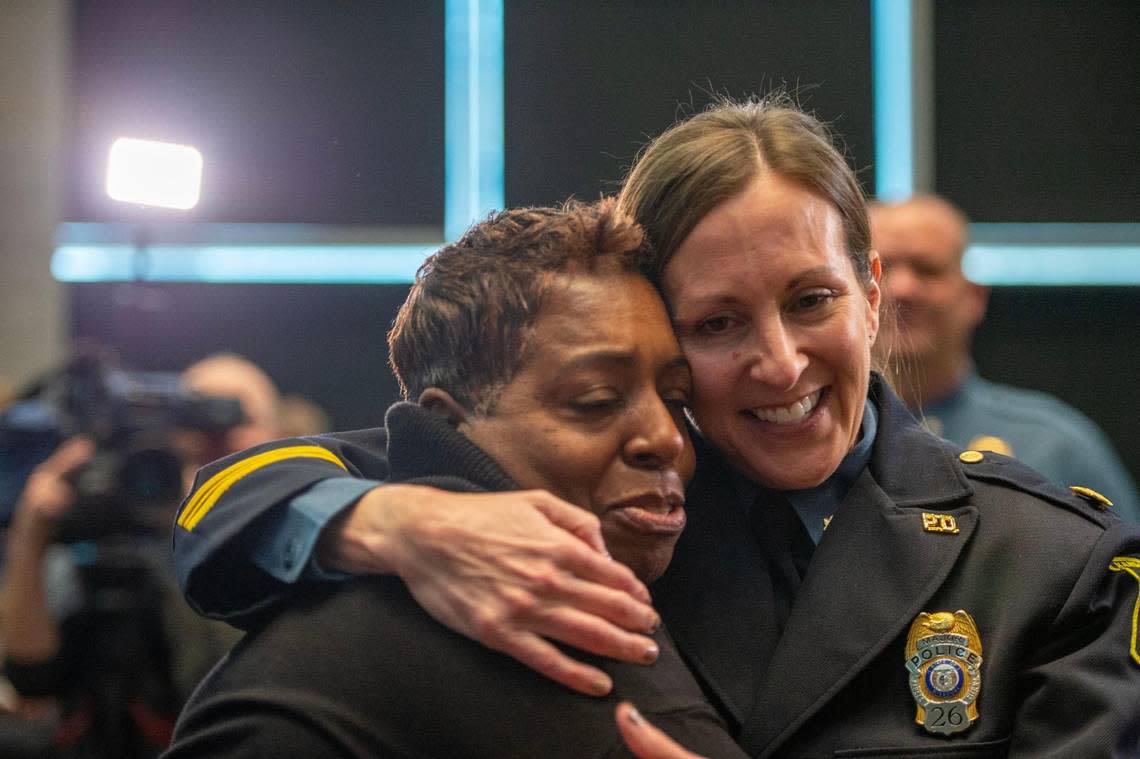 Doris Williams, left, hugs Stacey Graves after Graves was named the new chief of police for the Kansas City Police Department at a meeting of the Board of Police Commissioners, Thursday, Dec. 15, 2022.