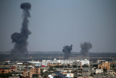 Smoke rises during Israeli air strikes in the southern Gaza Strip May 4, 2019. REUTERS/Ibraheem Abu Mustafa