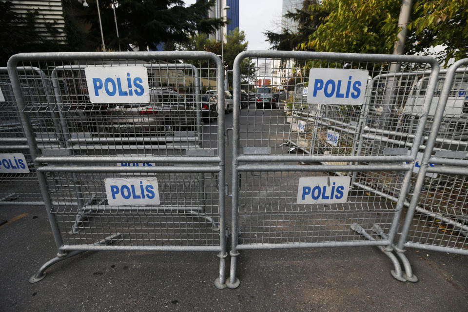 Barriers block the road leading to Saudi Arabia's consulate in Istanbul, Tuesday, Oct. 23, 2018. The Turkish president is expected to announce details Tuesday of his country's investigation into the killing of Saudi writer Jamal Khashoggi, as skepticism intensified about Saudi Arabia's account that he died accidentally in its consulate in Istanbul. (AP Photo/Lefteris Pitarakis)