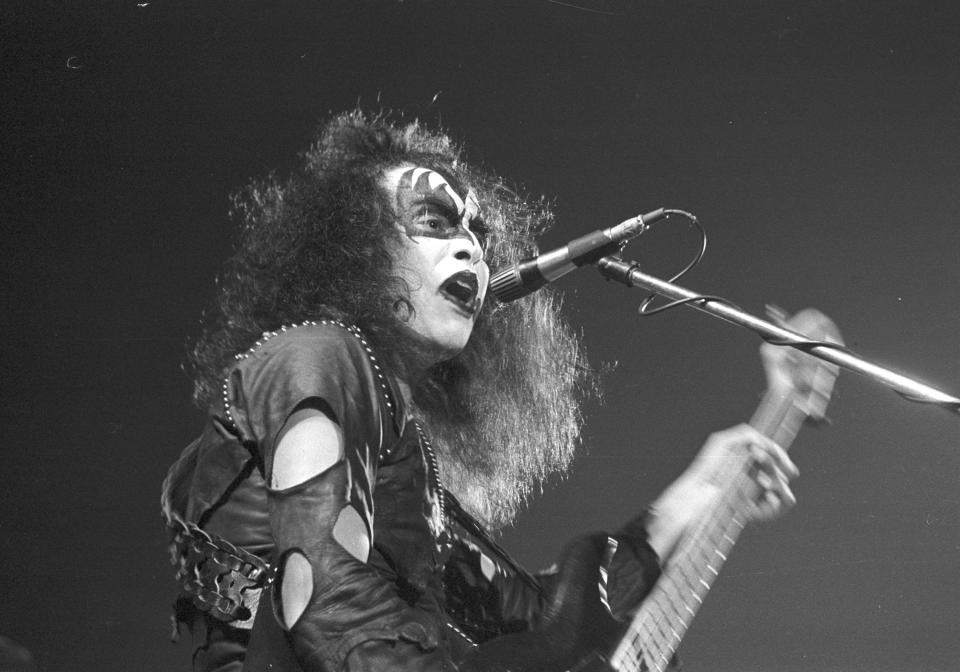 Simmons plays bass during a show at the Civic Auditorium in Long Beach, CA, on May 31, 1974. (Photo by Michael Ochs Archives/Getty Images) 