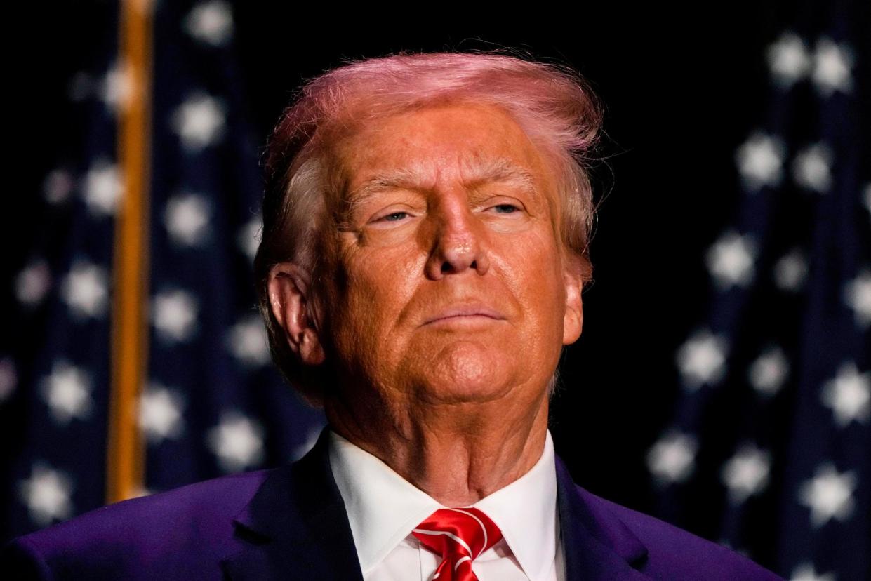 <span>Donald Trump in Sioux City, Iowa, on 29 October 2023. The former president faces 91 charges in four separate criminal cases.</span><span>Photograph: Charlie Neibergall/AP</span>