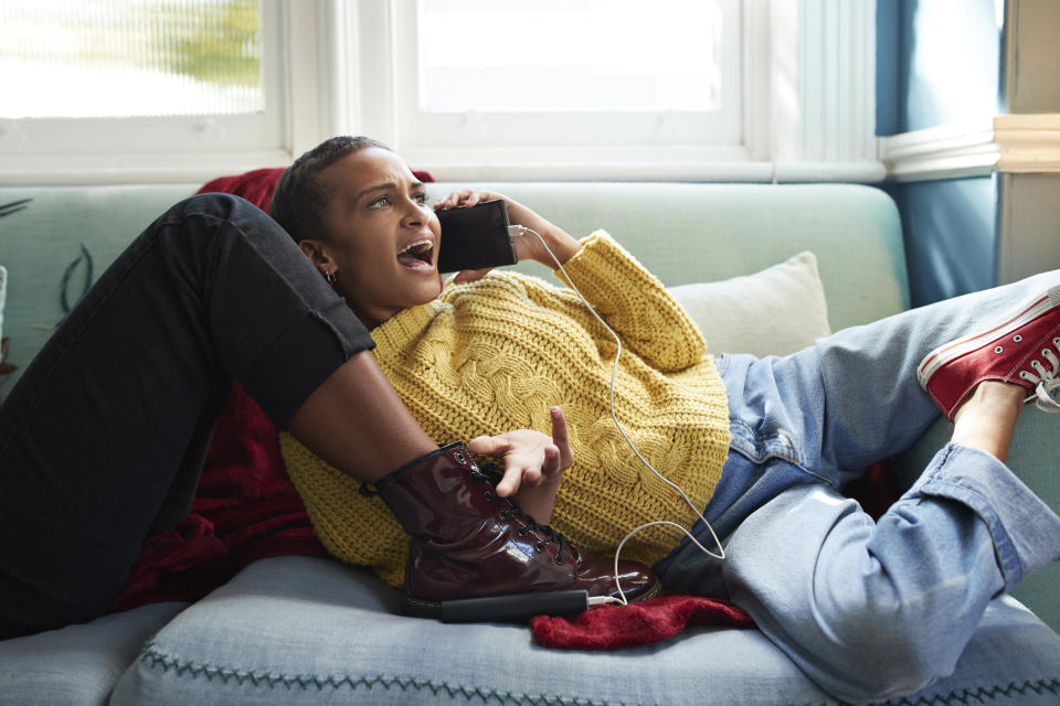 A woman is arguing over the phone