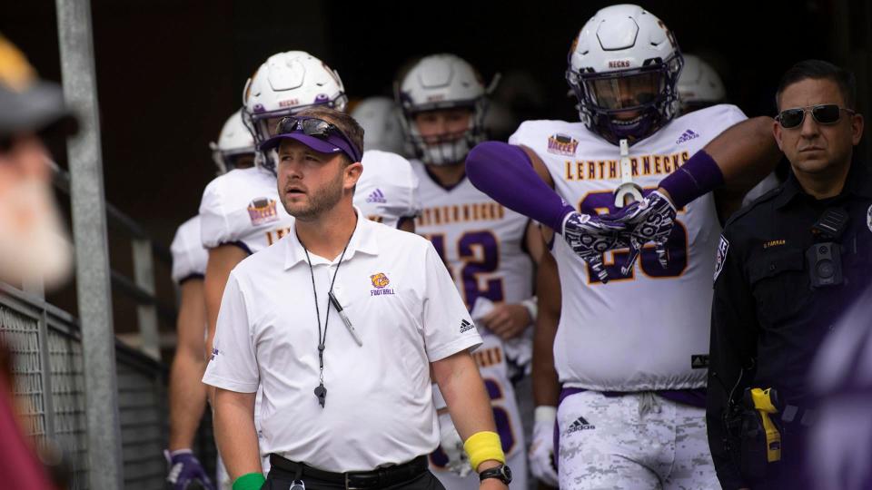 Myers Hendrickson stands with the Western Illinois football team during his time as coach. Hendrickson and the school separated in Nov. 2023 after two winless seasons at the Macomb school.