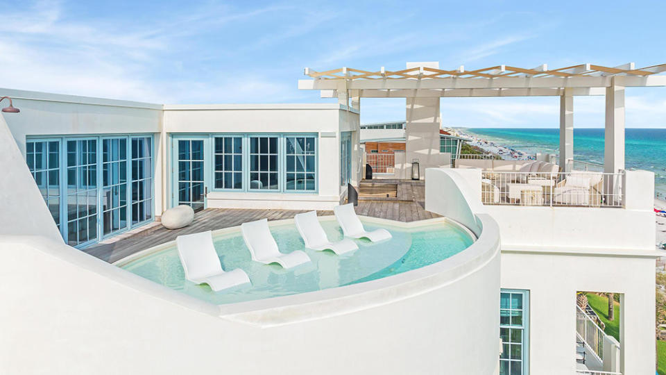 The top-floor deck with a plunge pool and outdoor seating - Credit: Dave Warren