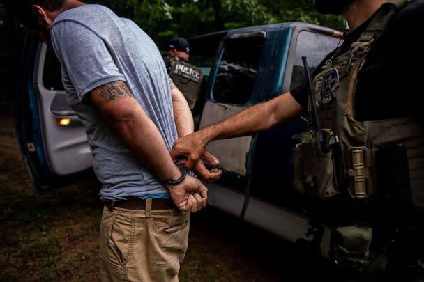 PHOTO: A man in handcuffs detained by US Marshals on an undated image shared by the Service. (US Marshals Service)