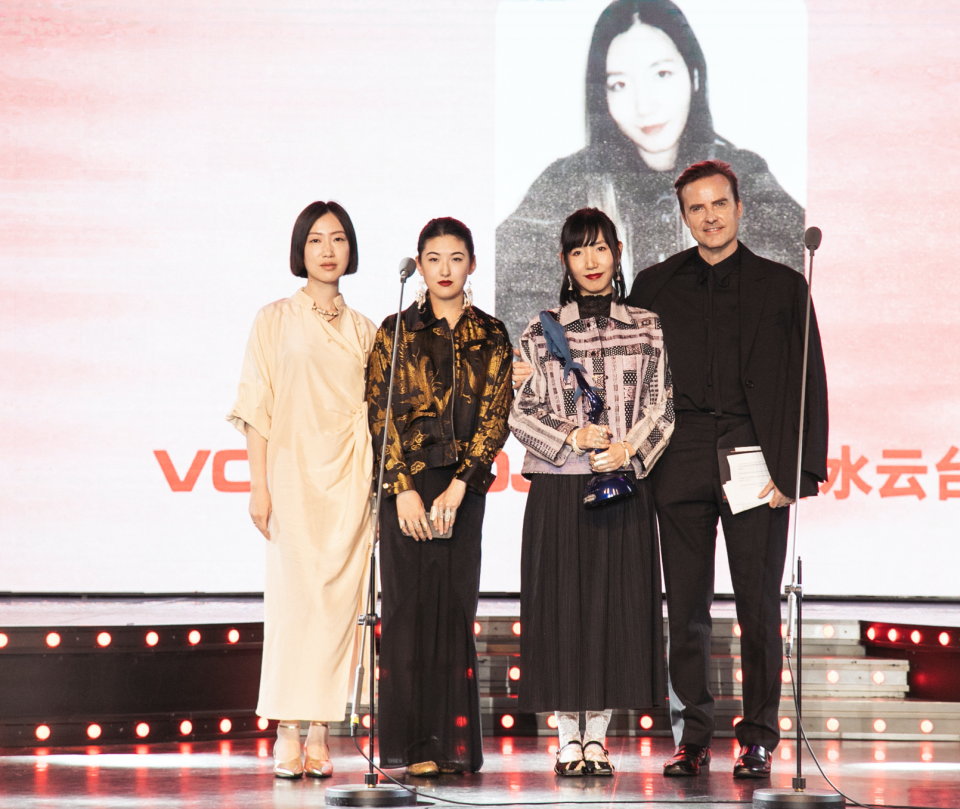 Von Project’s Wang Yunan, second from right, accepts her award. - Credit: Courtesy