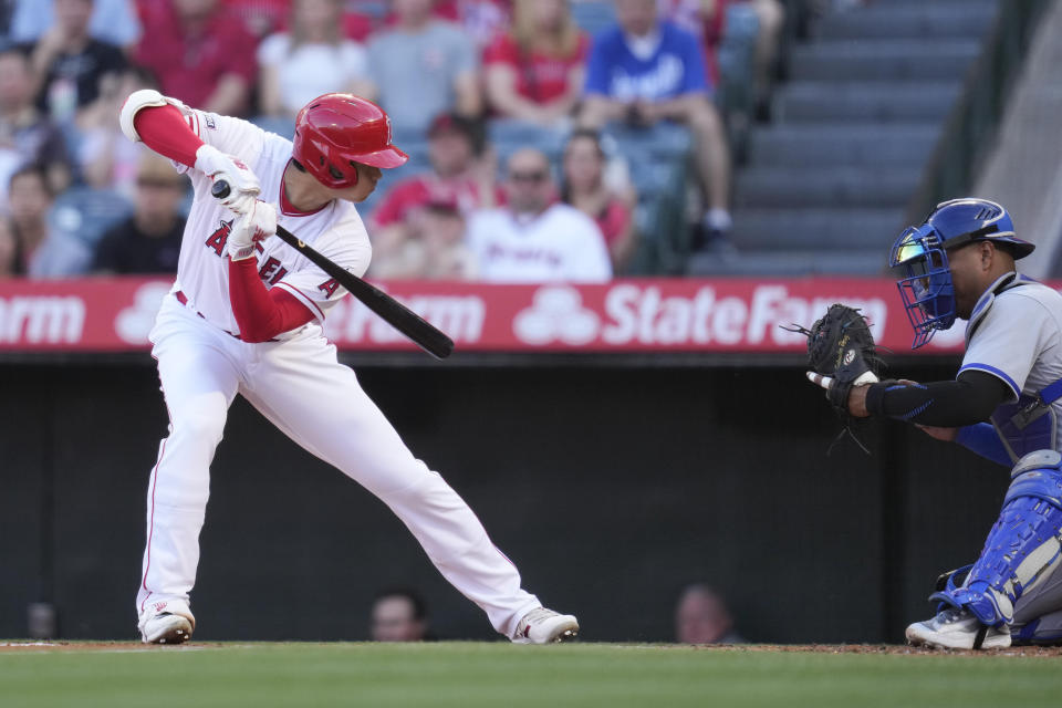 Los Angeles Angels designated hitter Shohei Ohtani (17) reacts after a throw during the first inning of a baseball game against the Kansas City Royals in Anaheim, Calif., Saturday, April 22, 2023. (AP Photo/Ashley Landis)