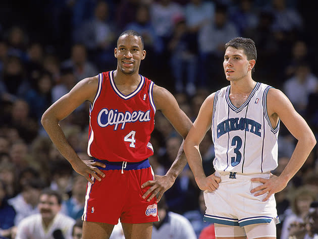 Ron Harper and Rex Chapman discuss the relative merits of cursive and pinstriping. (Getty Images)