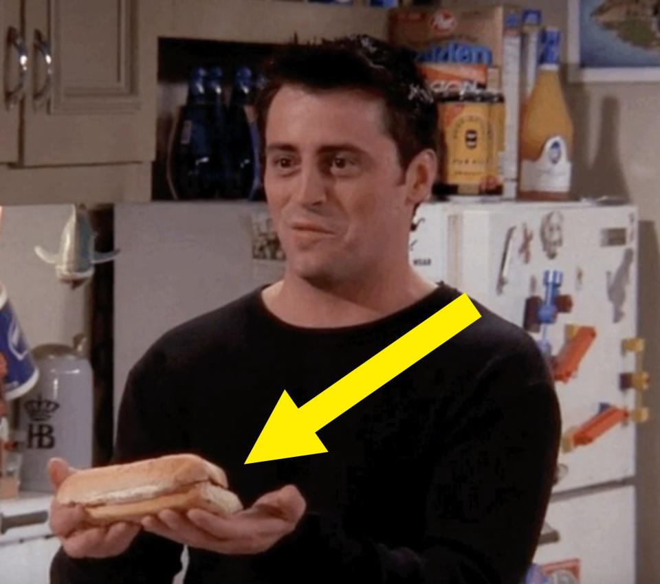 Joey from "Friends" holding a sandwich