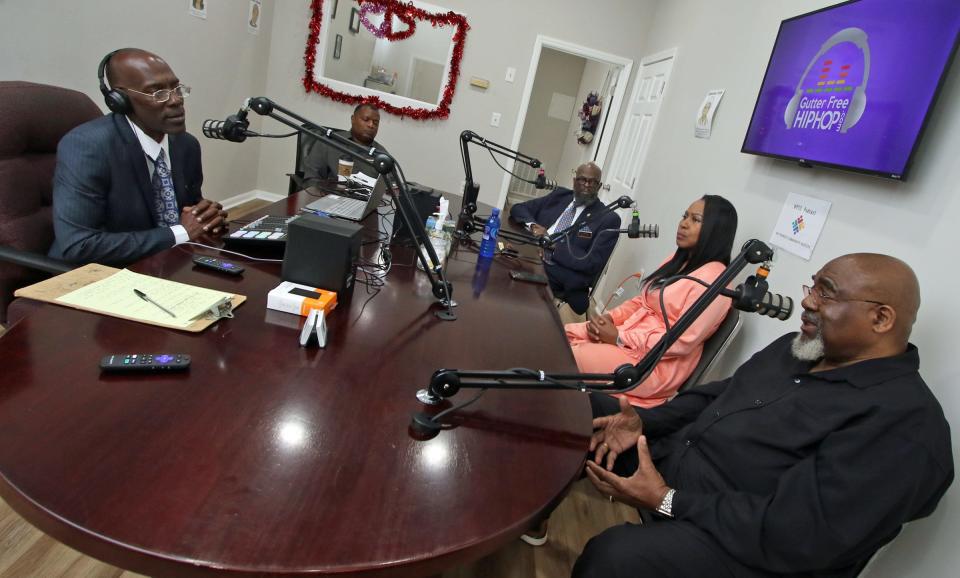 Jimmy Hall, left, interviews local members of the community during his “We Promote Community Success” podcast Tuesday morning, Feb. 28, 2023, at his studio in Shelby.