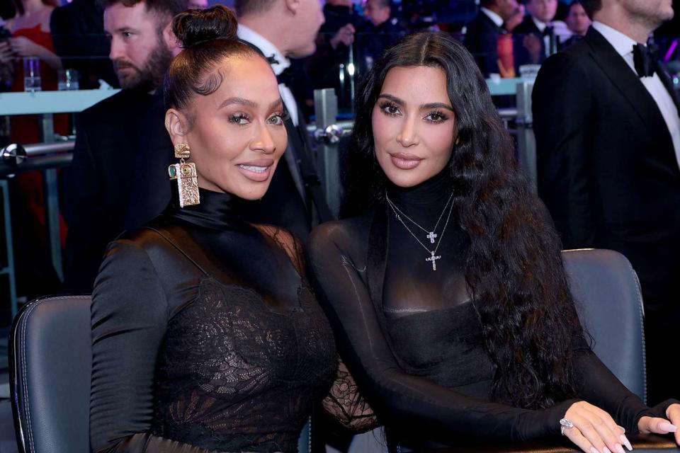 <p>Dimitrios Kambouris/Getty</p> La La Anthony (left) and Kim Kardashian