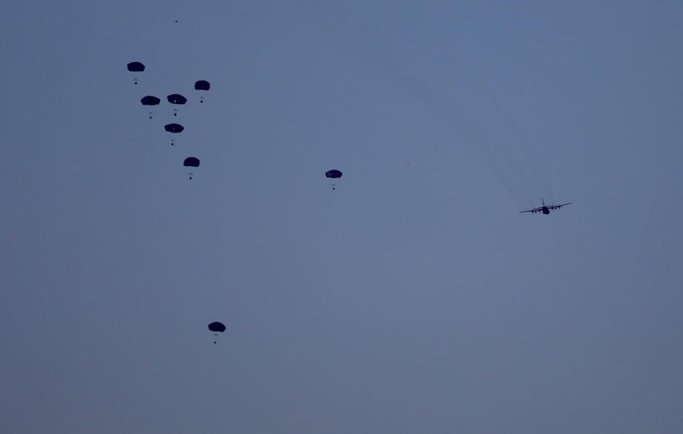 File - Humanitarian aid is dropped by the United States over Gaza City, Gaza Strip, on Saturday, March 2, 2024. (AP Photo/Mohammed Hajjar, File)